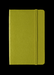 Image showing Olive green closed notebook isolated on black