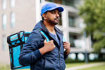 Image showing indian delivery man with bag in city