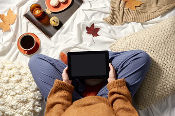 Image showing woman with tablet pc at home in autumn