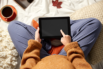 Image showing woman with tablet pc at home in autumn