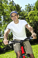 Image showing Man riding a bicycle