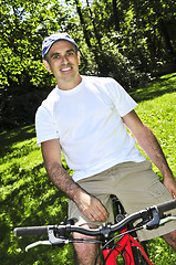 Image showing Man riding a bicycle