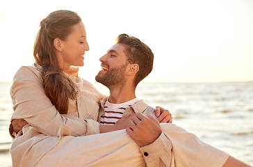 Image showing happy couple having fun on summer beach