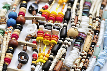 Image showing Wood and seashell bead necklaces