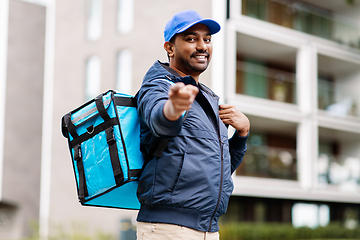 Image showing indian delivery man with bag pointing to camera