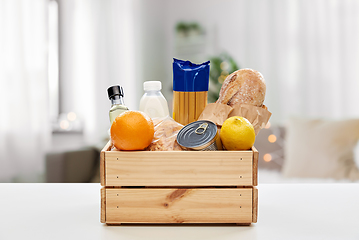 Image showing food in wooden box on table at home