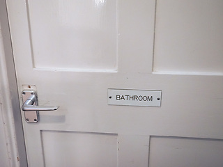 Image showing White bathroom door detail