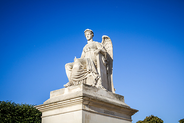 Image showing History statue near the Triumphal Arch of the Carrousel, Paris, 