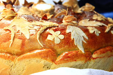 Image showing round loaf with floral patern