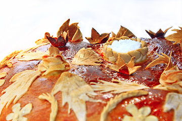 Image showing round loaf with floral patern and salt