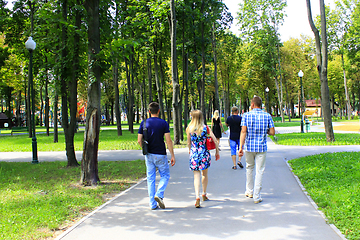 Image showing people have a rest in park with big trees