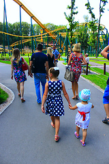 Image showing people have a rest in park with big trees