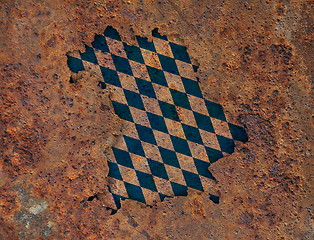 Image showing Map and flag of Bavaria on rusty metal