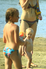 Image showing mother playing with her daughters at the river