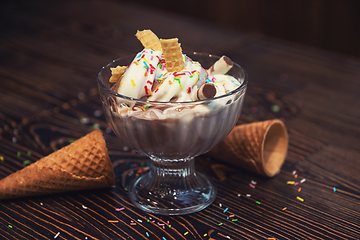 Image showing Ice-cream on wooden