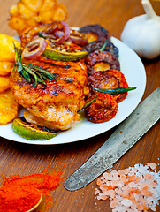 Image showing roasted grilled BBQ chicken breast with herbs and spices