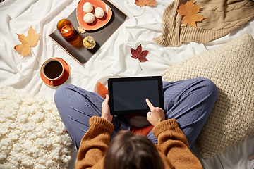 Image showing woman with tablet pc at home in autumn