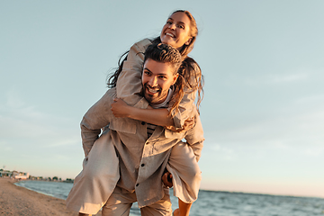 Image showing happy couple having fun on summer beach