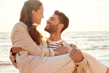 Image showing happy couple having fun on summer beach