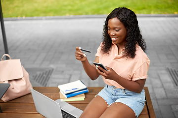 Image showing student girl with smartphone and credit card