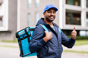 Image showing indian delivery man with bag showing thumbs up