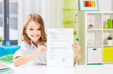 Image showing student girl with school test and A grade at home