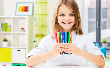 Image showing smiling student girl with felt-tip pens at home