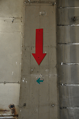 Image showing factory wall and arrow signs