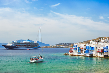 Image showing Little Venice houses in Chora Mykonos town with yacht and cruise ship. Mykonos island, Greecer