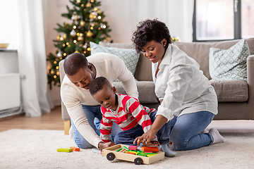 Image showing african family with toys on christmas at home