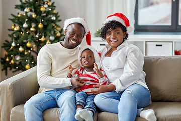 Image showing african american family at home on christmas