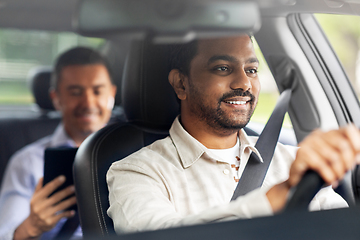 Image showing indian male driver driving car with passenger