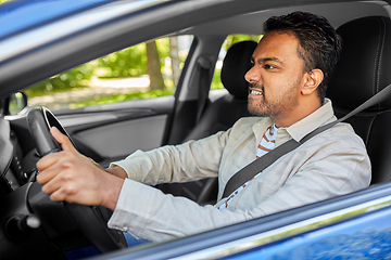 Image showing angry indian man or driver driving car