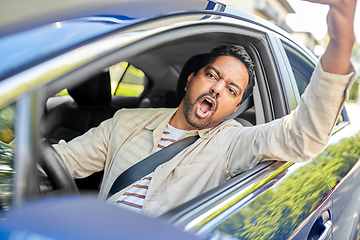 Image showing angry indian man or driver driving car