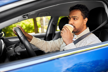 Image showing tired indian man or driver with coffee driving car