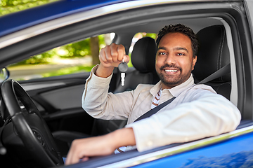 Image showing smiling indian man or driver showing car key