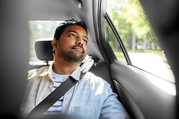 Image showing dreaming indian male passenger in taxi car