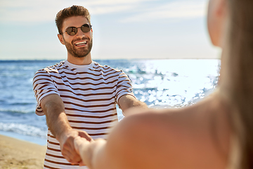 Image showing happy couple having fun on summer beach