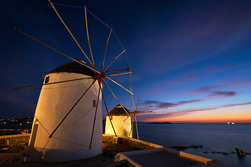 Image showing Traditional greek windmills on Mykonos island at sunrise, Cyclades, Greece