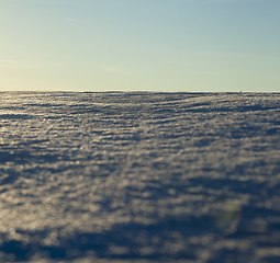 Image showing uneven drifts of white snow