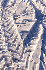 Image showing Traces of the car on the snow