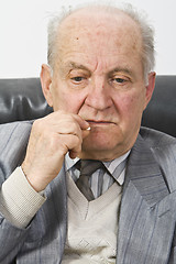 Image showing Senior man taking medication