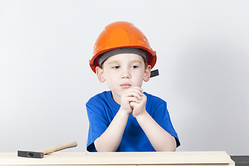 Image showing thoughtful boy in a helmet