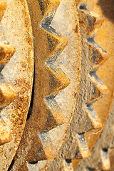Image showing rusty metal element of the agricultural plow close up