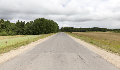 Image showing old dusty paved road