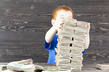 Image showing boy builds tower,