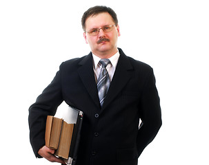 Image showing Businessman with laptop and books