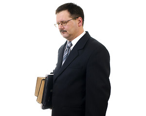 Image showing Businessman with laptop and books