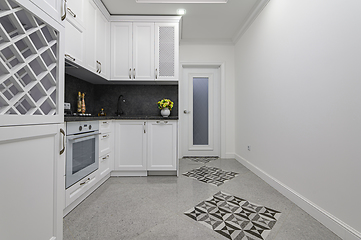 Image showing Luxury well designed modern black and white kitchen