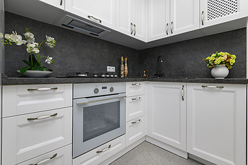 Image showing Luxury well designed modern black and white kitchen